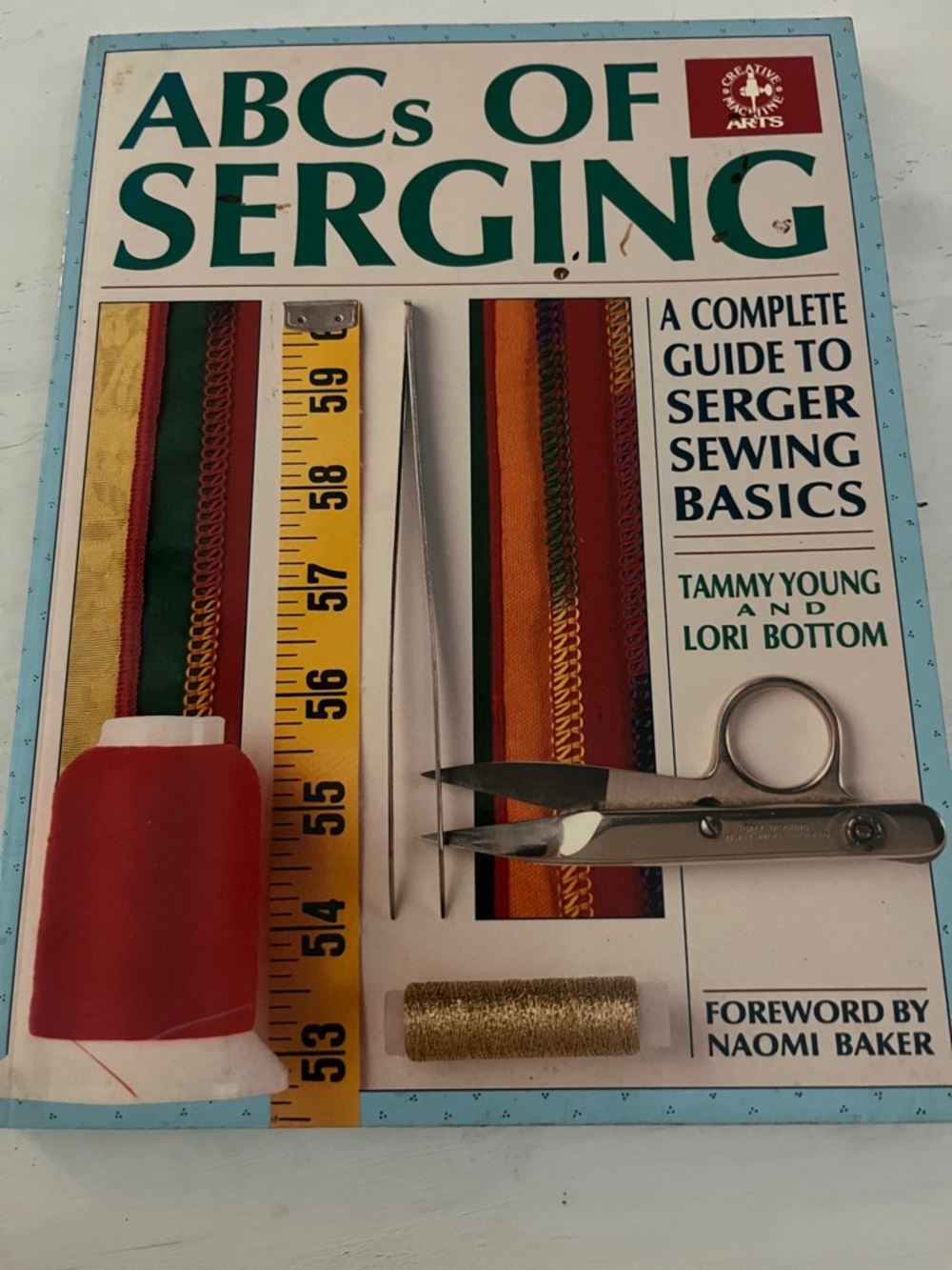 ABCs of Serging Sewing Guide - White & Teal Cover